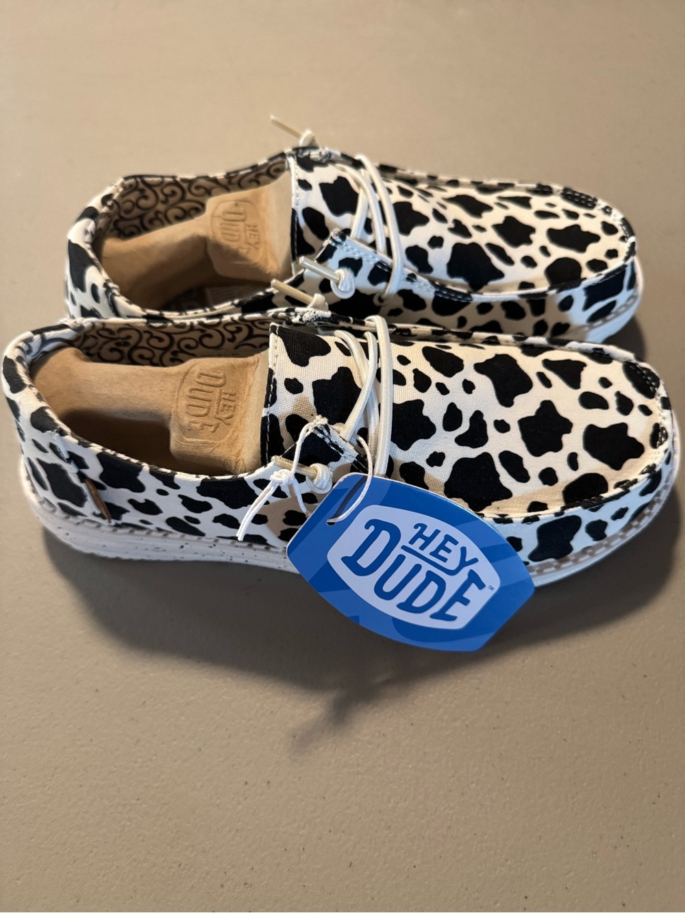 NWT Hey Dude Women’s Cow Print Slip-on Shoes size 8